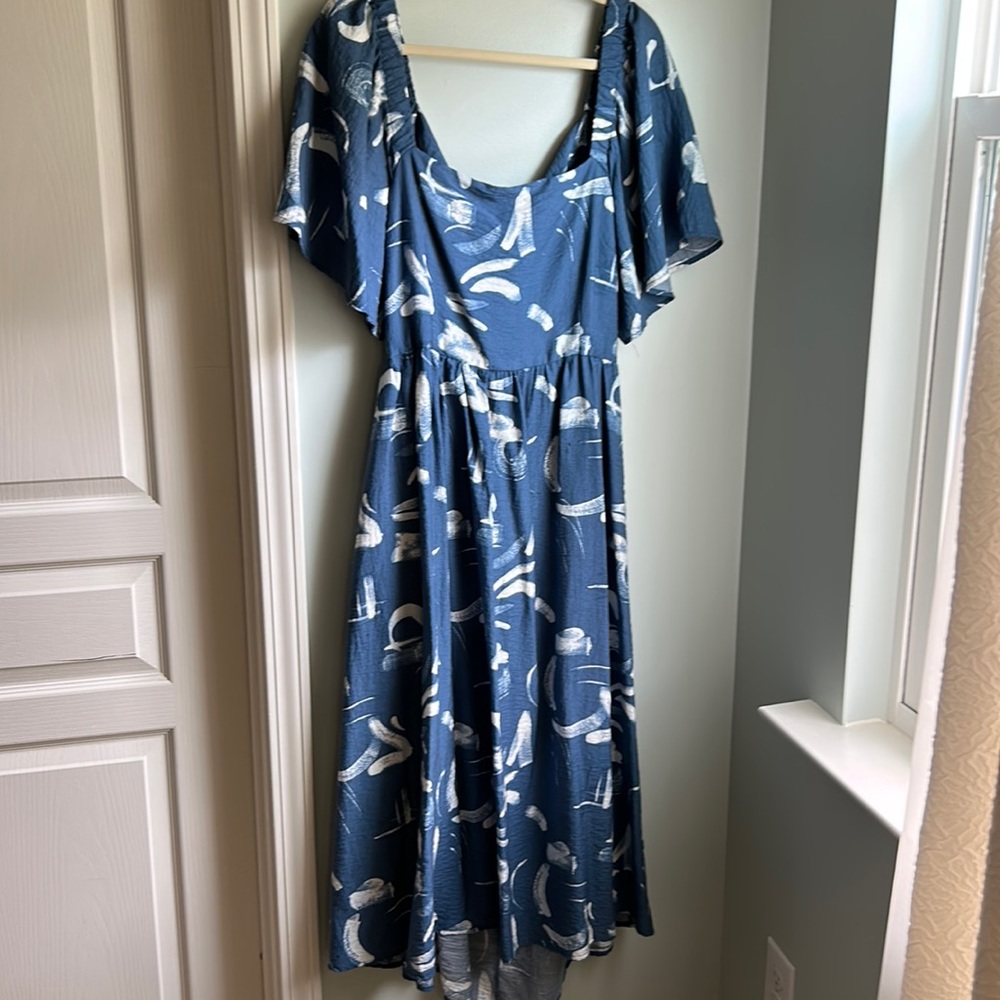 Open back flutter sleeve dress